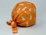 Load image into Gallery viewer, Hawaiian Pineapples on Orange - Scrub Hat
