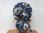 Load image into Gallery viewer, Wild Floral B - Scrub Hat - Ponytail
