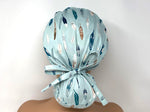 Load image into Gallery viewer, Colorful Feathers on Teal with Gold Print - Ponytail
